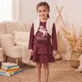 Robe fille bordeaux licorne portée, manches longues, effet boléro blanc, nœud à la taille et jupe à volants