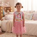Robe fille portée avec licorne à crinière rose et jupe en tulle rose à cœurs et étoiles brillants