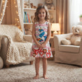 Robe fille licorne portée, rayures roses et blanches, pois noirs, crinière bleue et ballons cœur